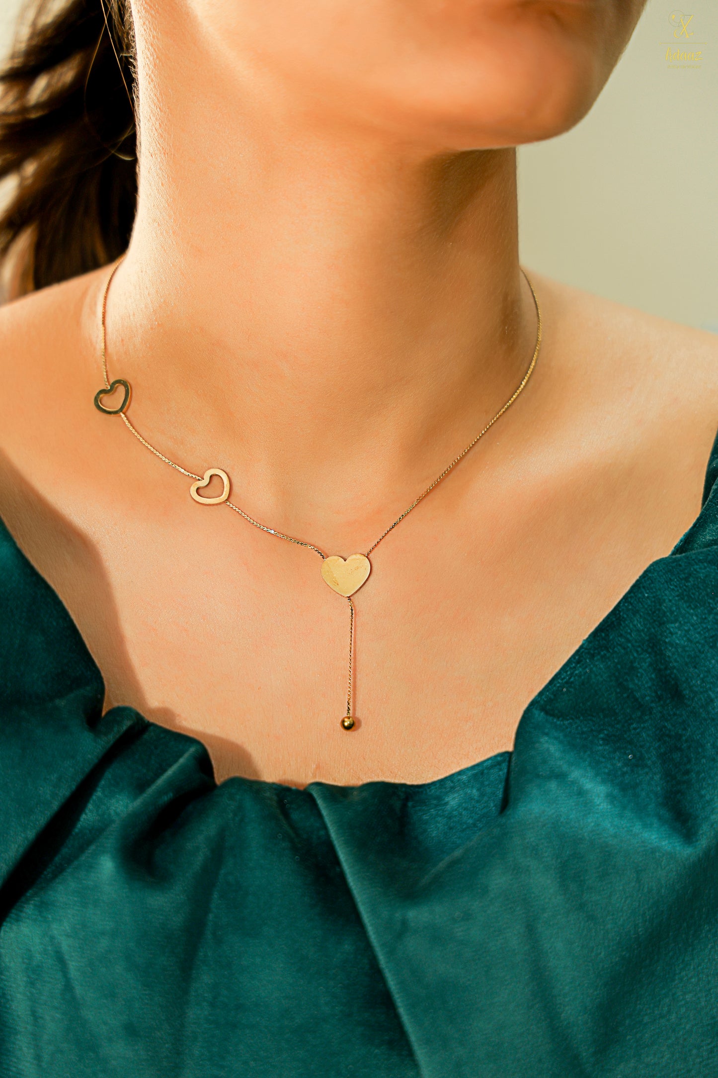 Delicate Gold Hearts Pendant Necklace - A Symbol of Elegance